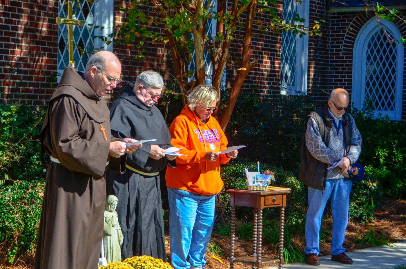 Opening prayers outside The Church of the Advent